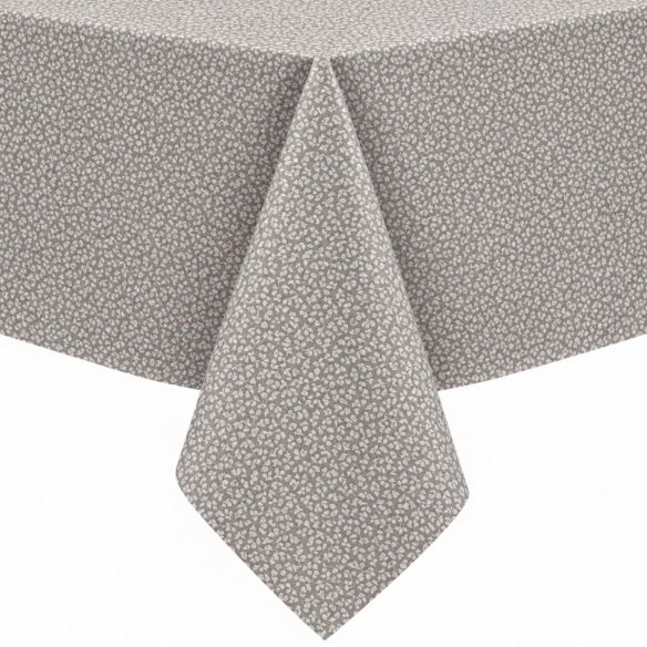 Gecoat tafellinnen Ribalta Grijs met een fijn wit bloemetjespatroon, strak gedrapeerd over de hoek van een tafel voor een nette presentatie.