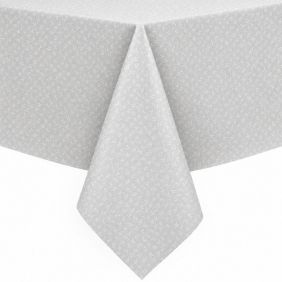 Wit gecoat tafellinnen Ribalta met een subtiel, herhalend patroon van kleine blaadjes, elegant gedrapeerd over een hoek van een tafel.