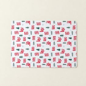 Kerst placemat met HoHoHo patroon in rood, groen en wit, perfect voor feestelijke tafels.