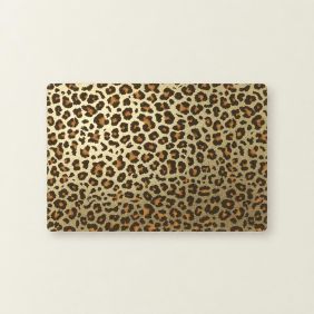 Rechthoekige placemat Ulla van 30x45 cm met een glanzend gouden luipaardprint in een opvallend en decoratief patroon voor op de eettafel.