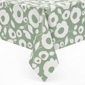 Tafelzeil Growing Up Sage met een wit bloemmotief op een zachtgroene achtergrond, strak over een hoek van een tafel gedrapeerd voor een mooi effect.